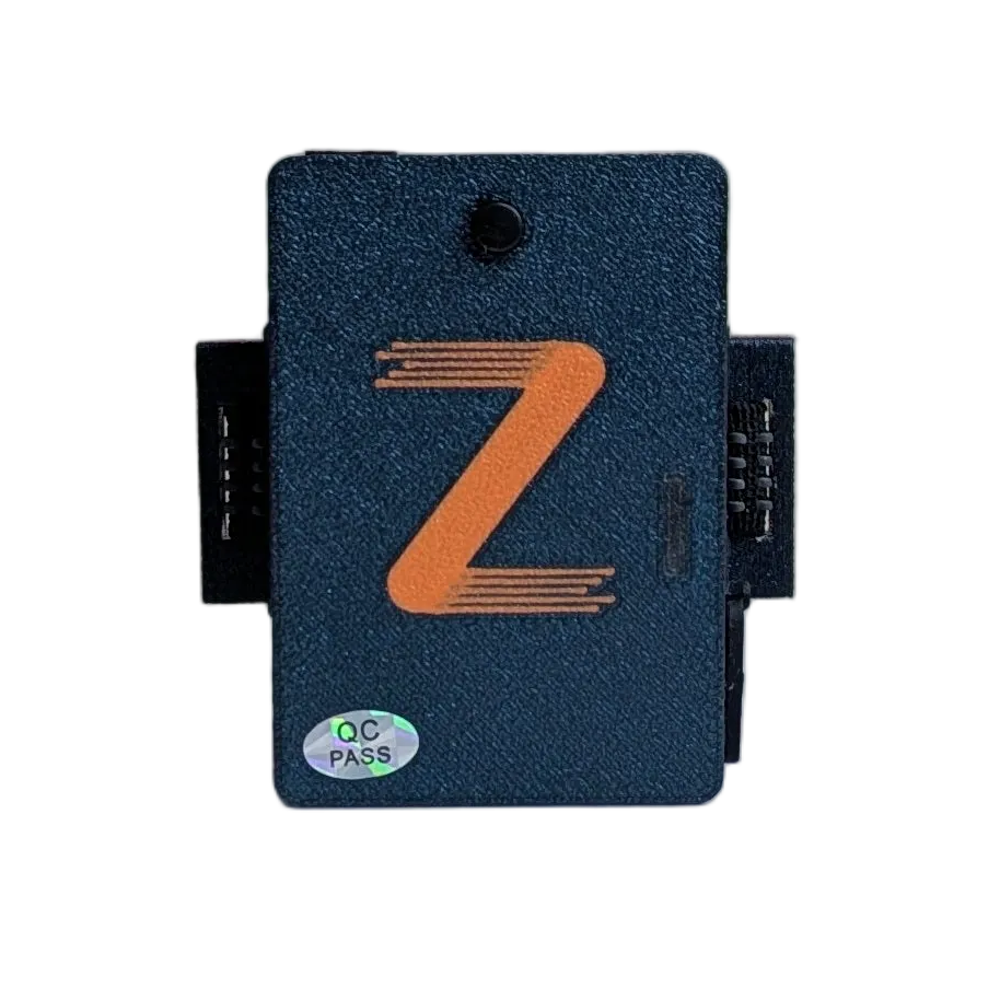 Front of a dark blue controller box with an orange Z logo and QC PASS sticker