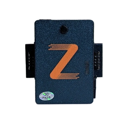 Front of a dark blue controller box with an orange Z logo and QC PASS sticker