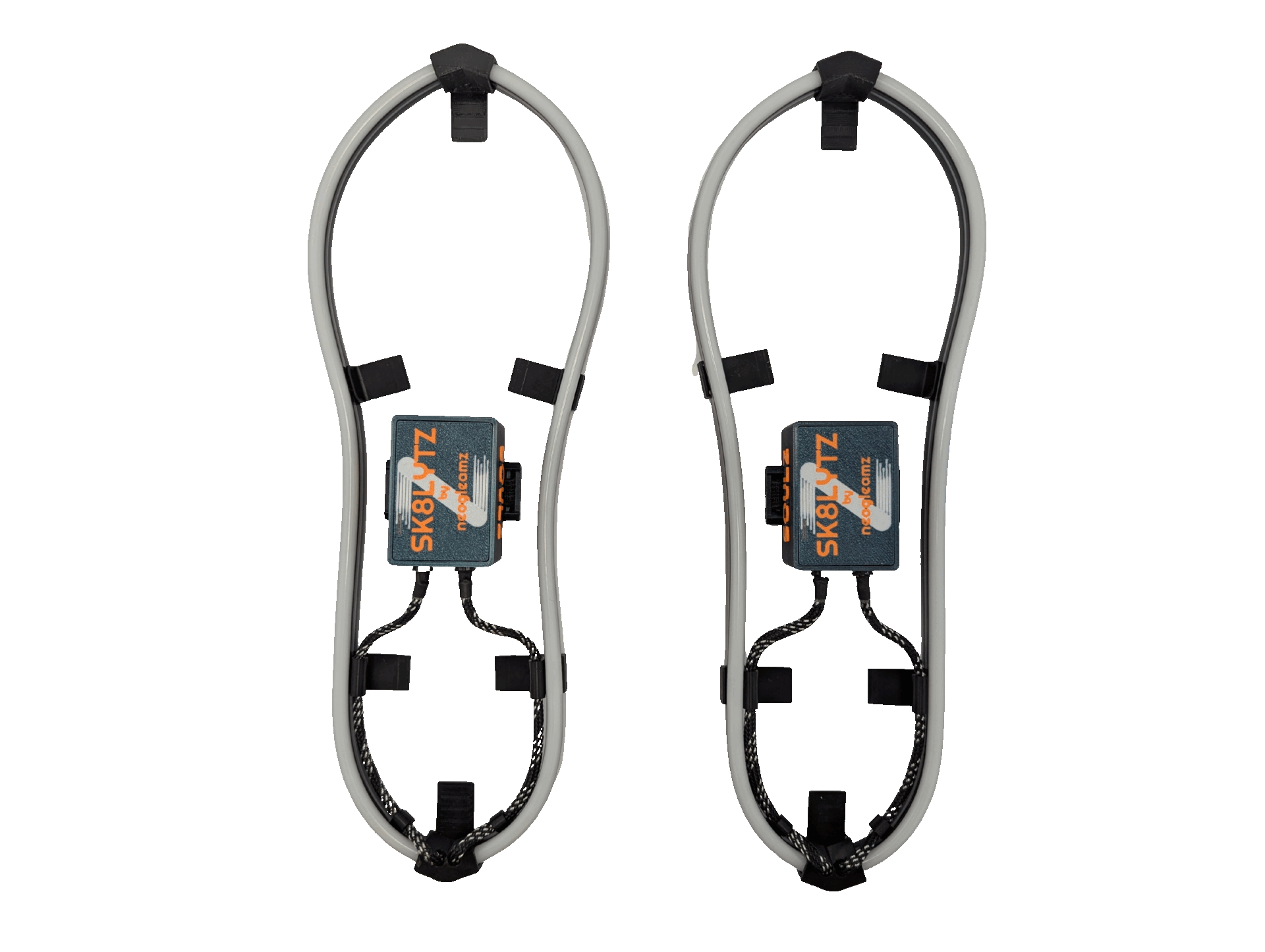 Pair of SK8Lytz Neogleamz orange-and-gray control units on loop-shaped LED light strips with black clips, laid flat